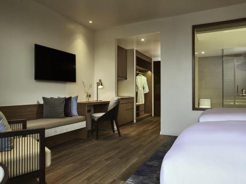 Estudio Doble con balcón - 2 camas del hotel Mövenpick Villas and Residences Phu Quoc. Foto 1