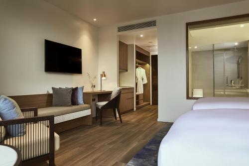 Estudio Doble con balcón - 2 camas del hotel Mövenpick Villas and Residences Phu Quoc. Foto 2