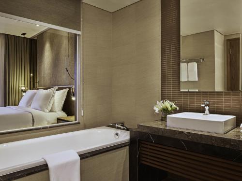 Two - Bedroom Family Studio with Sea View del hotel Mövenpick Villas and Residences Phu Quoc. Foto 1
