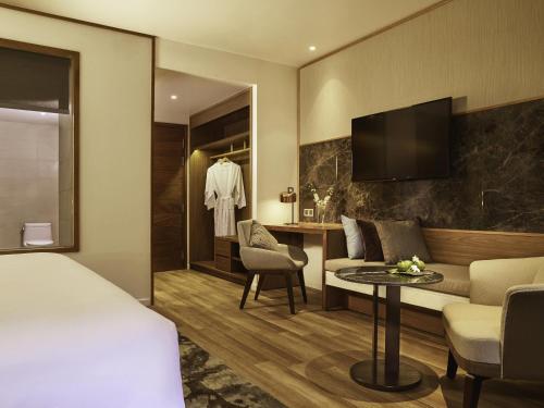 Two - Bedroom Family Studio with Sea View del hotel Mövenpick Villas and Residences Phu Quoc. Foto 2
