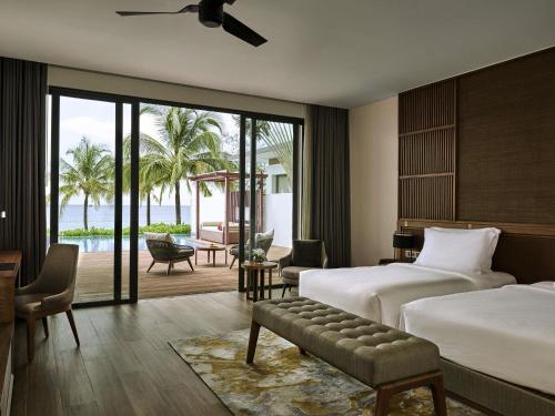 Presidential Four Bedroom Villa with Pool and Sea View del hotel Mövenpick Villas and Residences Phu Quoc. Foto 4