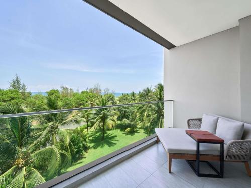 Habitación Familiar Deluxe con balcón del hotel Mövenpick Resort Waverly Phu Quoc