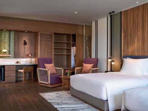 Habitación Familiar Deluxe con balcón del hotel Mövenpick Resort Waverly Phu Quoc. Foto 3