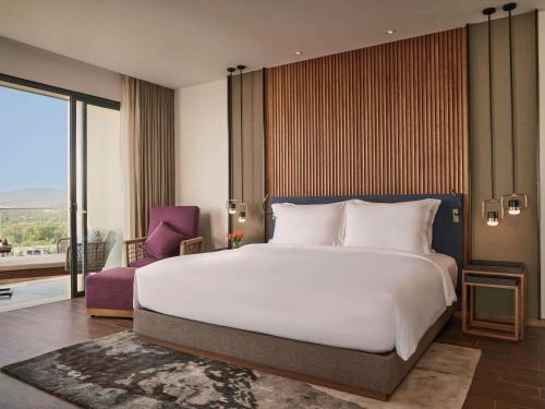 Sea View Suite Room with Balcony del hotel Mövenpick Resort Waverly Phu Quoc. Foto 4