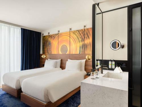 Habitación Doble Deluxe - 2 camas del hotel Pullman Budapest. Foto 1