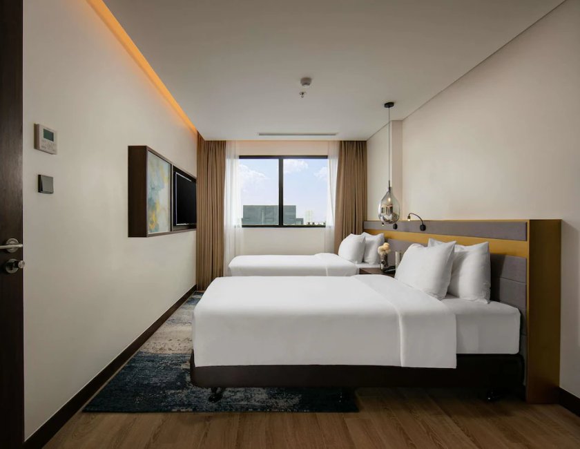 Suite 2 habitaciones 2 Camas dobles del hotel Mövenpick Living West Hanoi. Foto 7