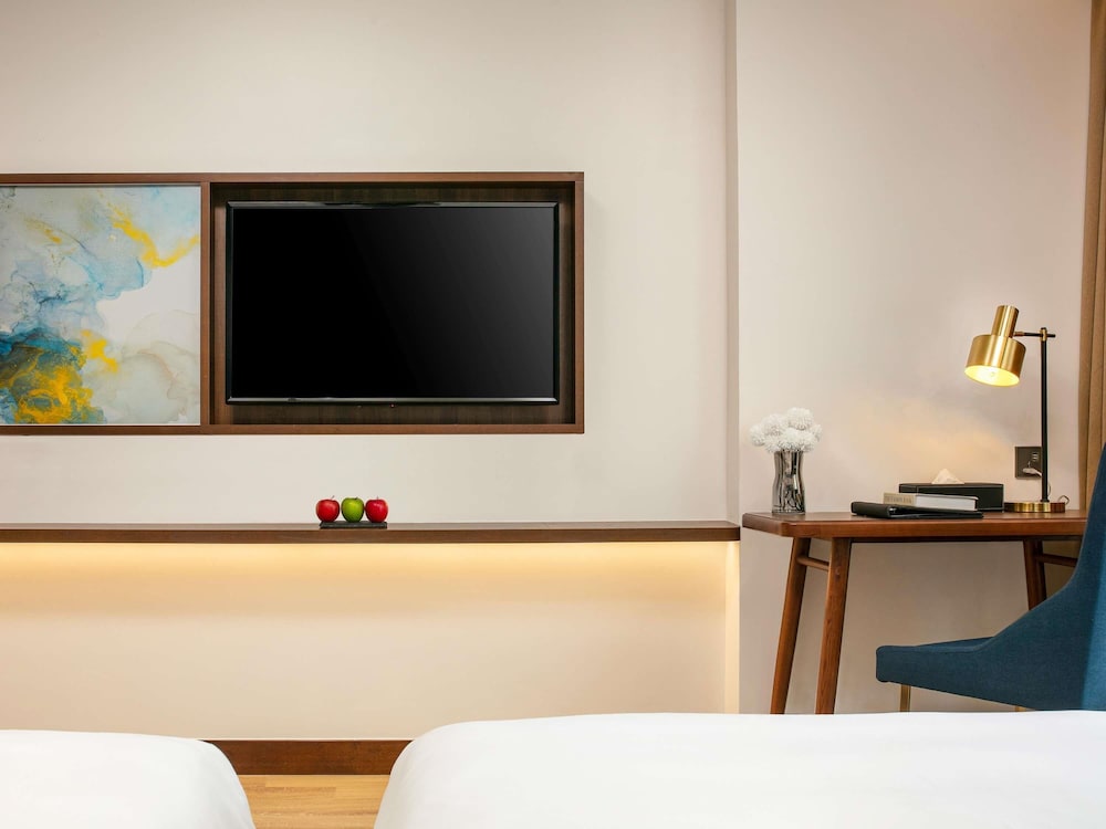 Habitación Ejecutiva con Dos Camas Individuales del hotel Mövenpick Living West Hanoi. Foto 3