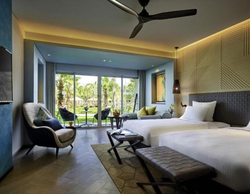 Habitación doble Vista Jardín Balcón o Terraza Con Vistas 2 Camas individuales Normal del hotel Pullman Phu Quoc Beach Resort. Foto 2