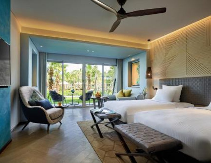Habitación doble Vista Jardín Balcón o Terraza Con Vistas 2 Camas individuales Normal del hotel Pullman Phu Quoc Beach Resort. Foto 3