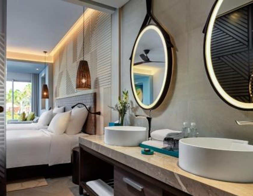Habitación doble Vista Jardín Balcón o Terraza Con Vistas 2 Camas individuales Normal del hotel Pullman Phu Quoc Beach Resort. Foto 4
