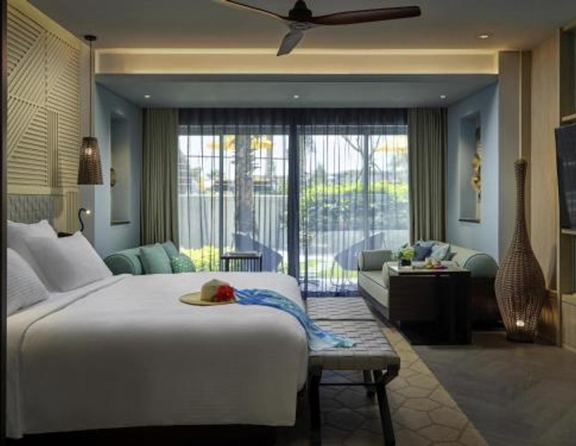 Suite Vista Jardín Balcón o Terraza 1 Cama king 2 habitaciones Privilege Business Con Vistas 2 Camas individuales del hotel Pullman Phu Quoc Beach Resort. Foto 1