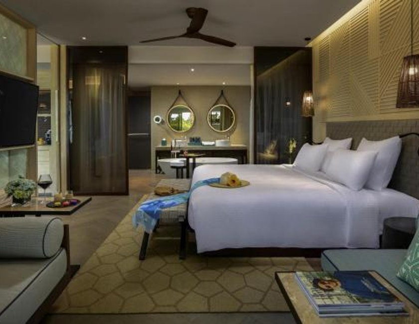 Suite Vista Jardín Balcón o Terraza 1 Cama king 2 habitaciones Privilege Business Con Vistas 2 Camas individuales del hotel Pullman Phu Quoc Beach Resort. Foto 2