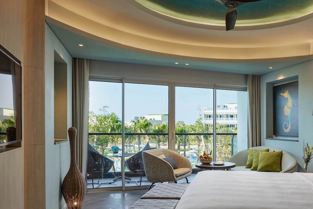 Habitación doble Vista Jardín Balcón o Terraza Superior 2 Camas individuales Normal del hotel Pullman Phu Quoc Beach Resort. Foto 3