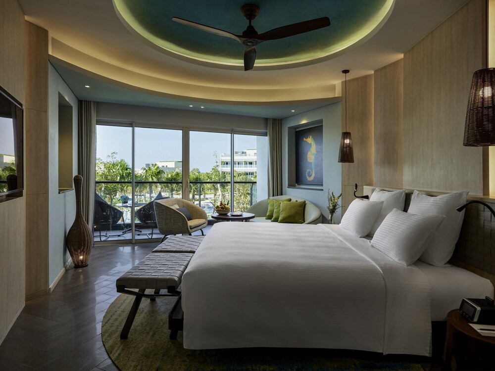 Habitación doble Vista Jardín Balcón o Terraza 1 Cama king del hotel Pullman Phu Quoc Beach Resort. Foto 2