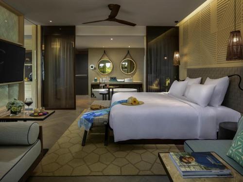 SUITE FAMILIAR EJECUTIVA, Pase de Privilegio Ejecutivo, 2 Dormitorios, Vista al Resort del hotel Pullman Phu Quoc Beach Resort. Foto 1