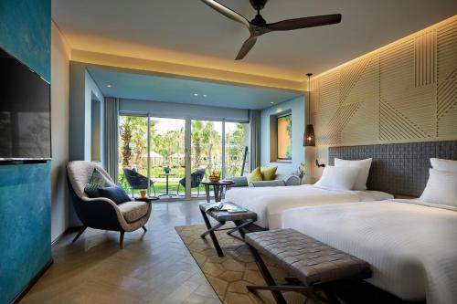 HABITACIÓN DELUXE, 2 Camas Individuales, Vista al Jardín del hotel Pullman Phu Quoc Beach Resort. Foto 3