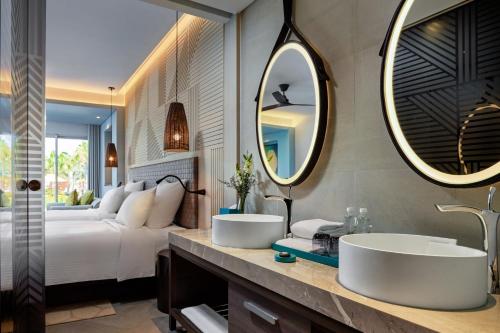 HABITACIÓN DELUXE, 2 Camas Individuales, Vista al Jardín del hotel Pullman Phu Quoc Beach Resort. Foto 4