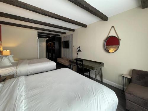 Mejora a Habitación Doble - No fumadores - 2 camas grandes del hotel The Century House an Ascend Hotel Collection Member. Foto 5