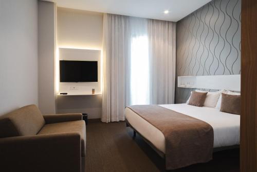 Habitación Doble con Cama supletoria del hotel Aj Gran Alacant. Foto 1