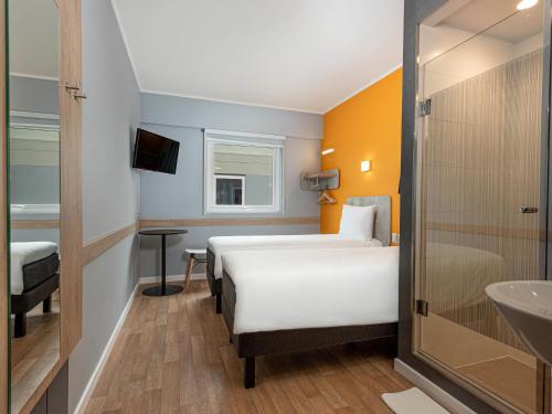 Habitación Doble Estándar - 2 camas del hotel Ibis Budget Lima Miraflores. Foto 1