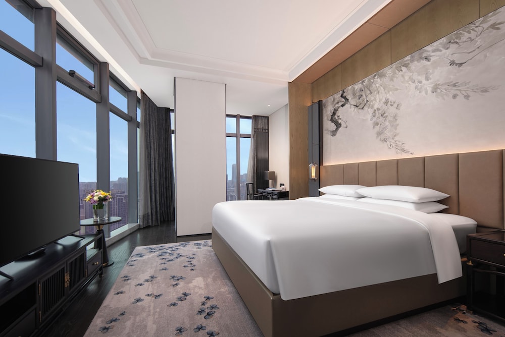 HABITACIÓN FAMILIAR, Una Cama King Size y Una Cama Individual, Decoración Temática y Vistas a la Ciudad del hotel Sofitel Hangzhou Yingguan. Foto 3