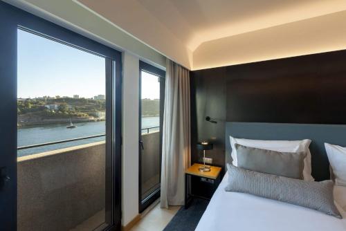 Habitación Doble Deluxe - 2 camas del hotel Neya Porto. Foto 2