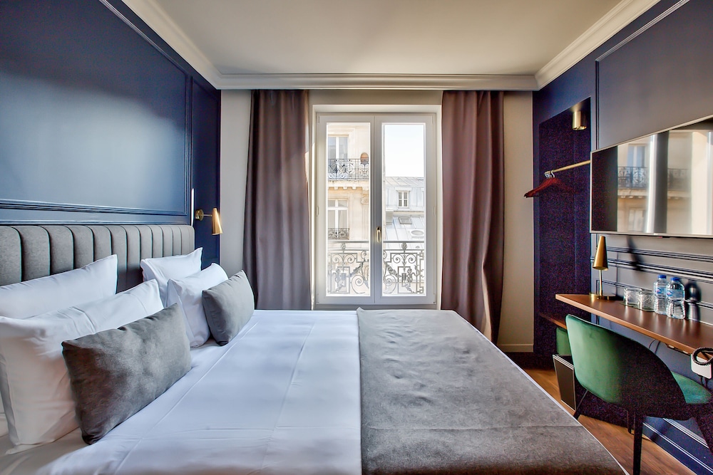 Habitación superior del hotel Maison Barbès. Foto 3