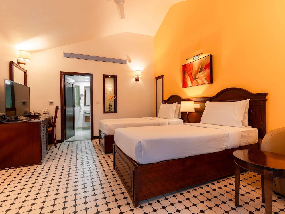 Habitación Villa Ejecutiva con 2 camas individuales, lado jardín del hotel novotel goa dona sylvia resort [ex. dona sylvia]