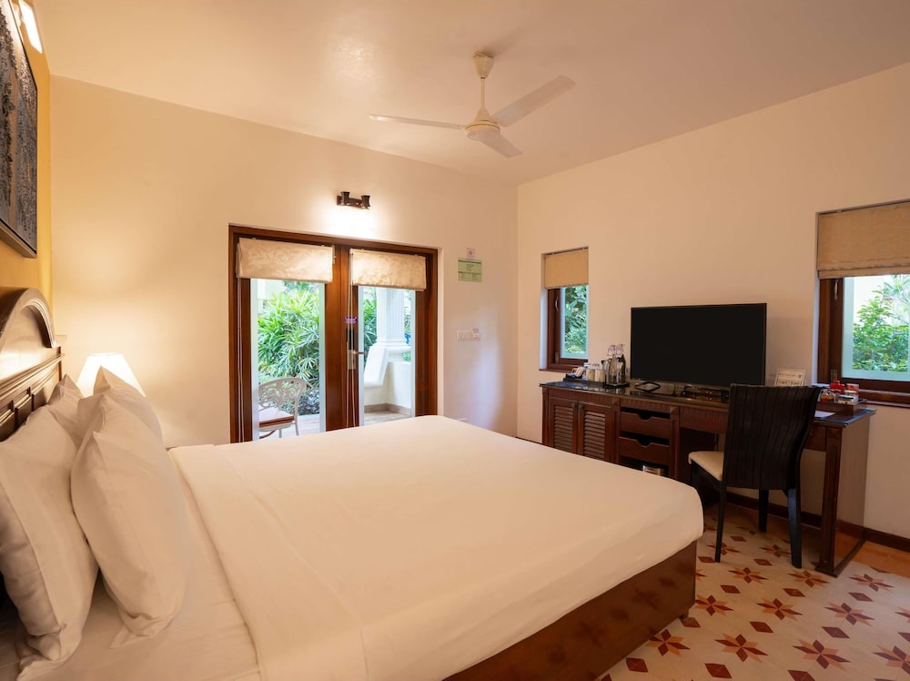 Habitación King Villa Ejecutiva con vistas a la piscina del hotel novotel goa dona sylvia resort [ex. dona sylvia]. Foto 6
