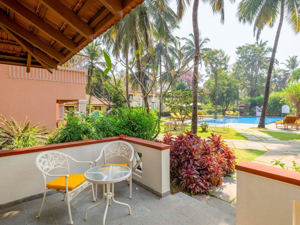 Habitación Twin Villa Ejecutiva con vistas a la piscina del hotel novotel goa dona sylvia resort [ex. dona sylvia]. Foto 3