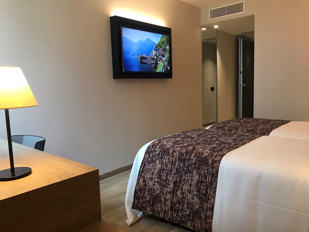 Habitación estándar con 2 camas individuales del hotel 3k Porto Aeroporto. Foto 1