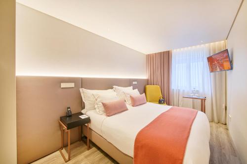 Habitación Doble Estándar con vistas a la ciudad del hotel Moon and Sun Braga. Foto 3
