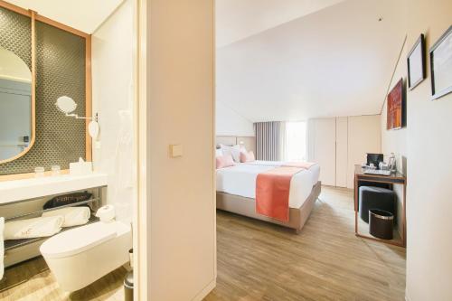 Habitación Doble Premium - 1 o 2 camas del hotel Moon and Sun Braga