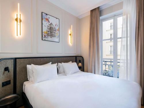 Apartamento de 1 dormitorio del hotel Adagio Paris Opera. Foto 6