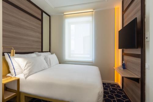 Habitación cómoda del hotel Pestana CR7 Gran Vía Madrid
