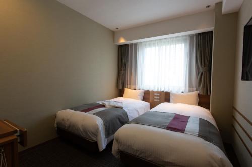 Habitación Doble Económica - 2 camas del hotel Shinsaibashi Grand Osaka
