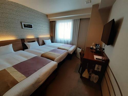 Habitación Triple del hotel Shinsaibashi Grand Osaka