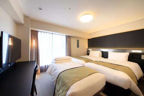 Habitación Premier Triple - Fumadores del hotel Richmond Premier Asakusa International. Foto 5