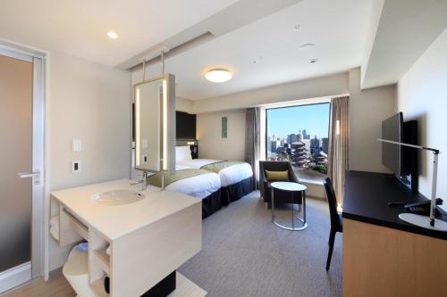 Habitación Doble para fumadores - 2 camas del hotel Richmond Premier Asakusa International. Foto 7