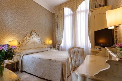 Habitación Doble Deluxe con cama supletoria - 1 o 2 camas del hotel Canaletto. Foto 1