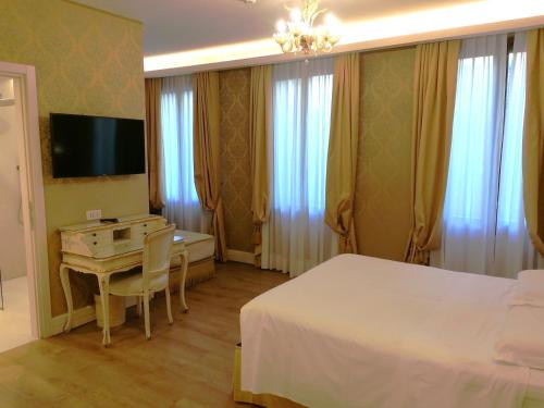 Habitación Triple Deluxe del hotel Canaletto