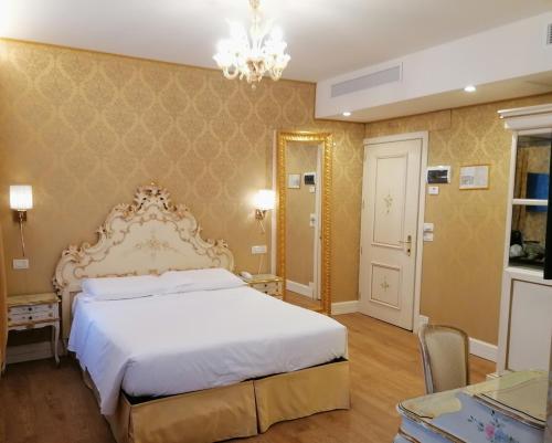 Habitación Triple Deluxe del hotel Canaletto. Foto 2