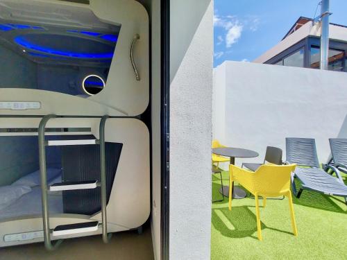 Suite Cápsula con terraza del hotel Atypicap Capsule. Foto 9