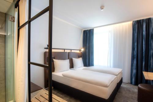 Habitación Doble Confort del hotel H2 Budapest. Foto 2