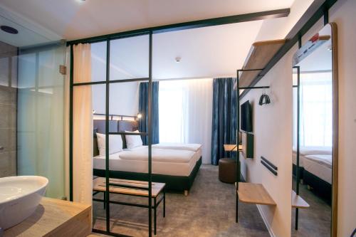 Habitación Doble Confort del hotel H2 Budapest. Foto 6