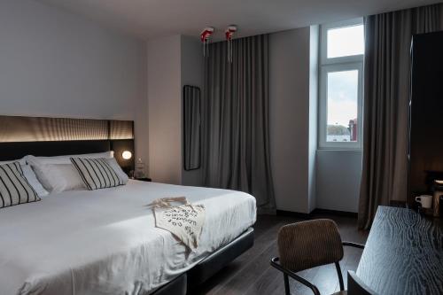 Habitación Deluxe con vistas a la ciudad del hotel Chic and Basic Gravity. Foto 8
