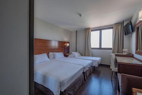 Habitación Triple Clásica del hotel Hidalgo. Foto 1