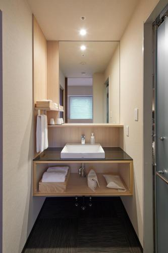 Habitación Superior - 1 cama grande del hotel Amanek Kanazawa. Foto 6
