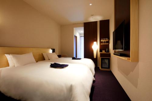 Habitación Doble Superior - 2 camas del hotel Amanek Kanazawa. Foto 1