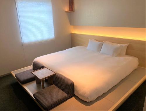 Habitación Superior con cama extragrande del hotel Amanek Kanazawa. Foto 2